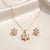 Stellara Bloom star flower necklace and earrings set with sparkling stones by Evvara Vogue