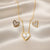 Pearlheart Whisper heart necklace in mother of pearl gold finish by Evvara Vogue