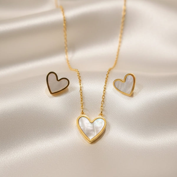 Pearlheart Whisper heart necklace in mother of pearl gold finish by Evvara Vogue
