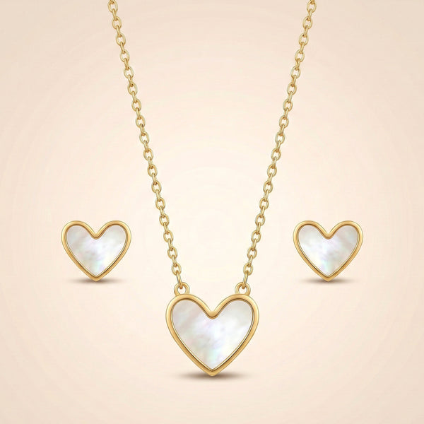 Elegant heart necklace and earrings set in mother of pearl by Evvara Vogue