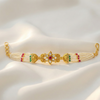 Traditional pearl bracelet with floral kundan centerpiece and gold detailing