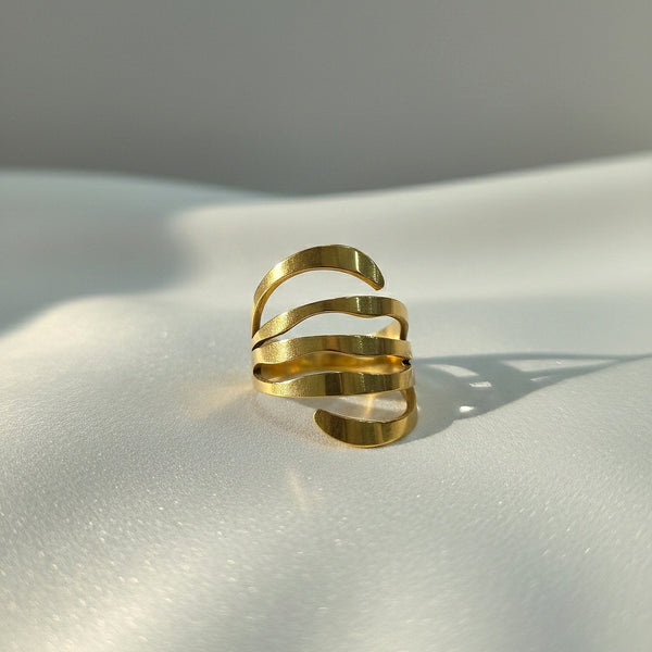 Gold tone open spiral ring