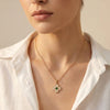 Emerald green clover pendant necklace