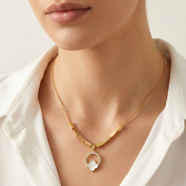 Minimal clover halo pendant detailing in gold stainless steel jewellery