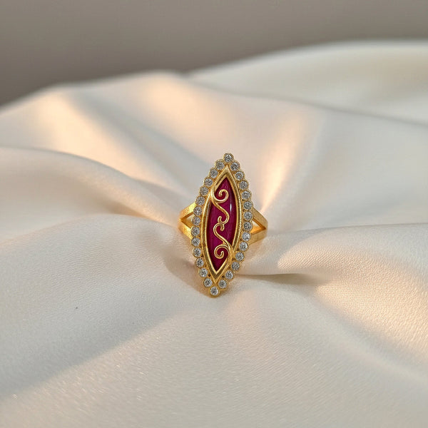 Marquise ruby color ring with gold finish and cubic zirconia stones