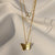 Butterfly gold pendant necklace with textured wings in anti tarnish stainless steel – Evvara Vogue