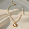 Anti-tarnish stainless steel pearl drop pendant necklace with gold-tone chain