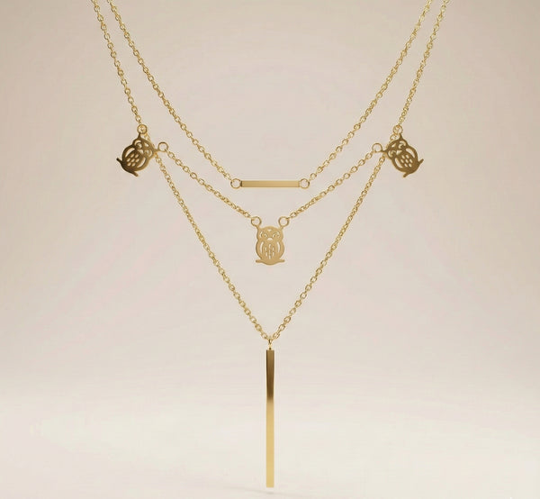 anti tarnish necklace with owl charms and gold bar pendants