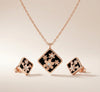 Luxury floral pendant and earring set in black and gold – Evvara Vogue jewellery