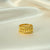 Gold-plated textured band ring for women by Evvara Vogue
