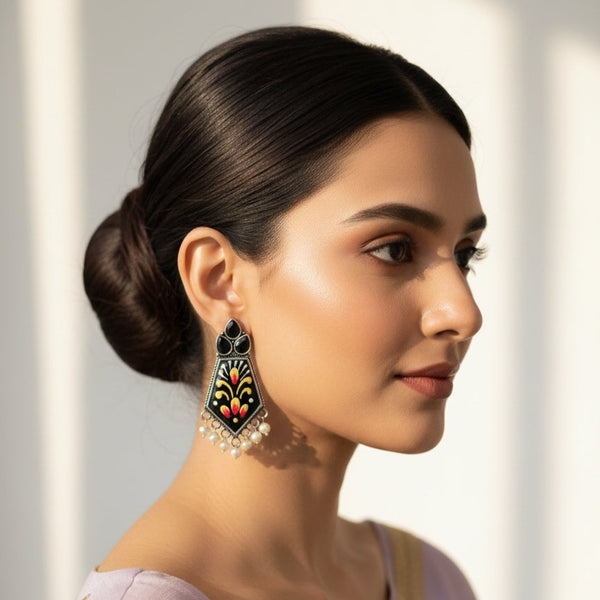 Woman wearing a traditional earring with a blurred background