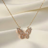 Aurélia Wing butterfly pendant necklace in gold finish with crystal detailing by Evvara Vogue