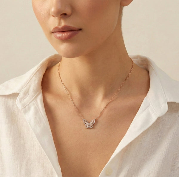 butterfly pendant showcasing crystal pavé wings and fine gold craftsmanship