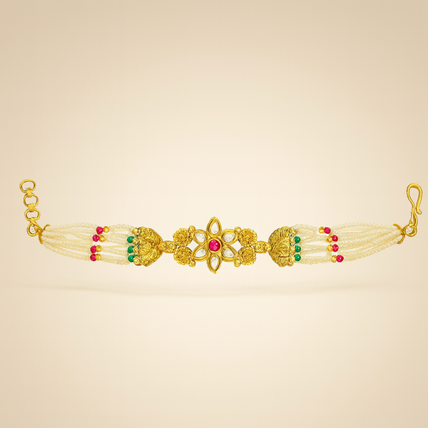 Multi-strand pearl bracelet with green and pink bead accents and gold finish