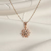 Evvara Stellar Whisper rose gold star pendant necklace with diamond detailing
