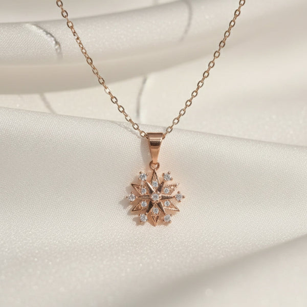 Evvara Stellar Whisper rose gold star pendant necklace with diamond detailing