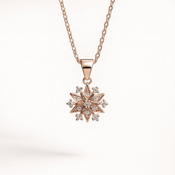 Close-up of Evvara Stellar Whisper star pendant showcasing intricate stone setting