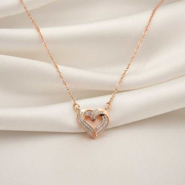 Evvara Twin Pulse rose gold double heart pendant in anti-tarnish stainless steel