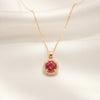 Scarlet Halo ruby red halo pendant in gold tone stainless steel by Evvara Vogue