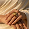 Indian kundan inspired ring close-up on fabric background