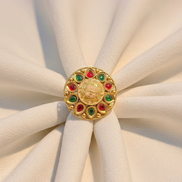 Traditional kundan style circular ring with red and green stones