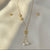 Starlace Drop star and pearl necklace in anti tarnish stainless steel by Evvara Vogue