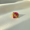 Square ruby tone statement ring with green stone detailing
