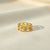 Gold-tone floral cutwork anti-tarnish ring