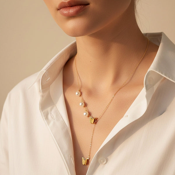 Butterfly chain necklace with pearl detailing in gold finish anti tarnish stainless steel