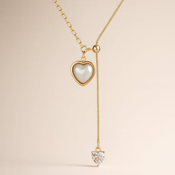 Minimal gold heart necklace styled for everyday elegance – Evvara Vogue