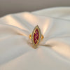 Marquise ruby color ring with gold finish and cubic zirconia stones