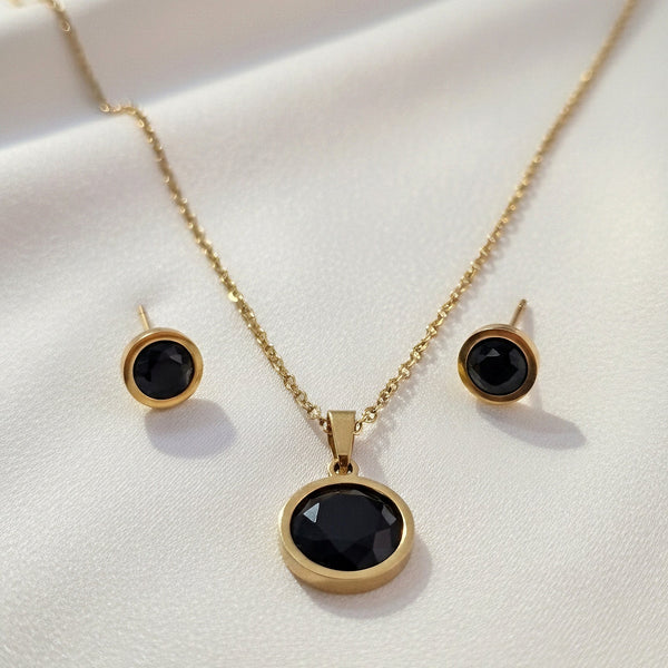 Black stone stainless steel anti tarnish pendant set with matching stud earrings.