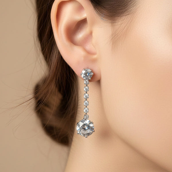Silver tone crystal long drop earrings