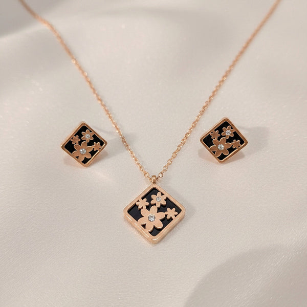 Black floral square pendant necklace with gold detailing – Evvara Vogue