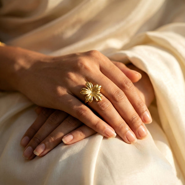 Modern floral gold tone ring